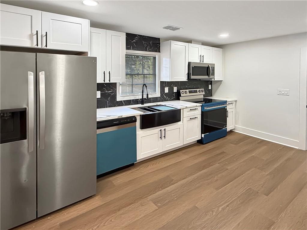 4 bedroom, 2 bathroom, 1,326 sq ft single family residence for sale at 4133 Canby Lane, Decatur, GA 30035 — photo 5