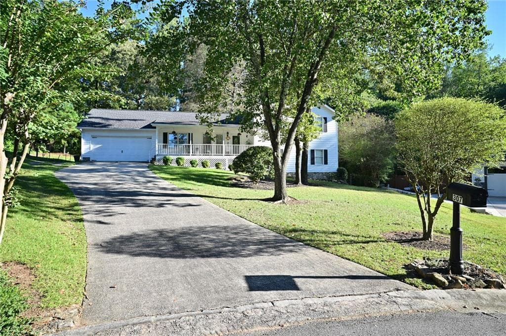 4 bedroom, 2 bathroom, 1,976 sq ft single family residence for sale at 307 Rockland Way, Lawrenceville, GA 30046 — photo 4