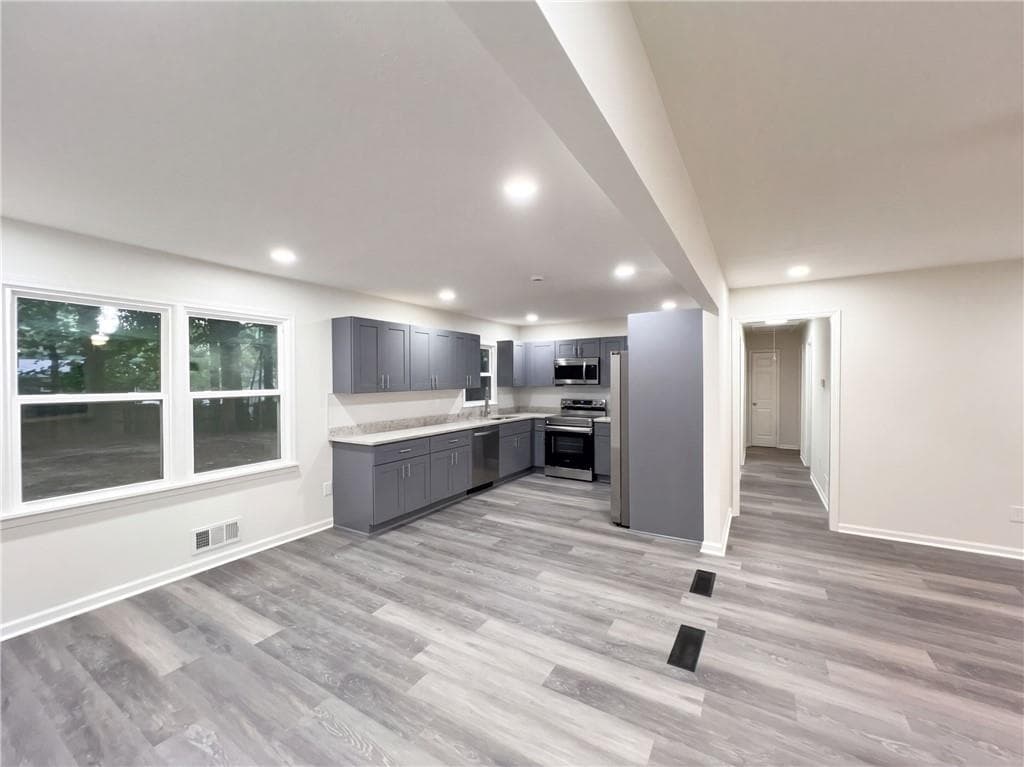 3 bedroom, 2 bathroom, 1,143 sq ft single family residence for sale at 4059 Canby Lane, Decatur, GA 30035 — photo 2