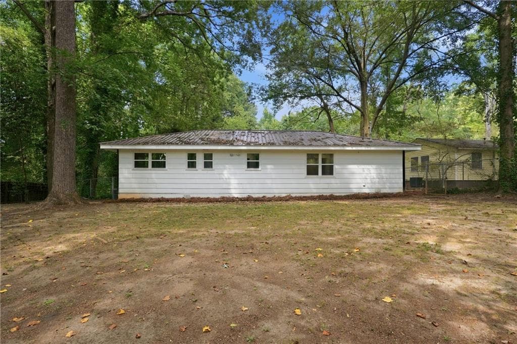 3 bedroom, 2 bathroom, 1,143 sq ft single family residence for sale at 4059 Canby Lane, Decatur, GA 30035 — photo 5
