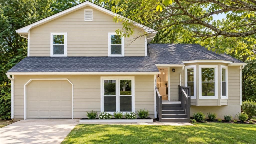 4 bedroom, 3 bathroom, 1,632 sq ft single family residence for sale at 6202 Saint Christophers Court, Lithonia, GA 30058 — photo 3
