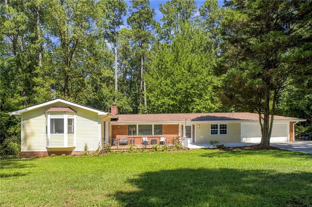 4 bedroom, 2 bathroom, 2,006 sq ft single family residence for sale at 1100 Boat Rock Road, Atlanta, GA 30331 — photo 2