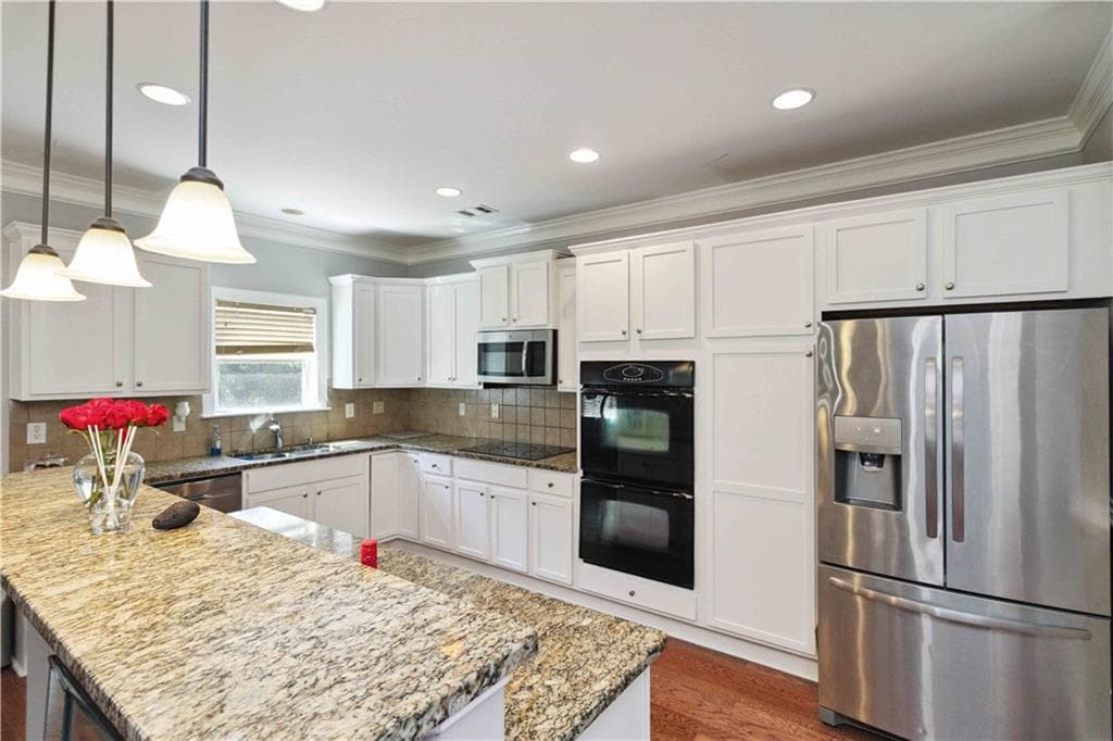 5 bedroom, 4 bathroom, 3,533 sq ft single family residence for sale at 1169 Leybourne Cove, Lawrenceville, GA 30045 — photo 6