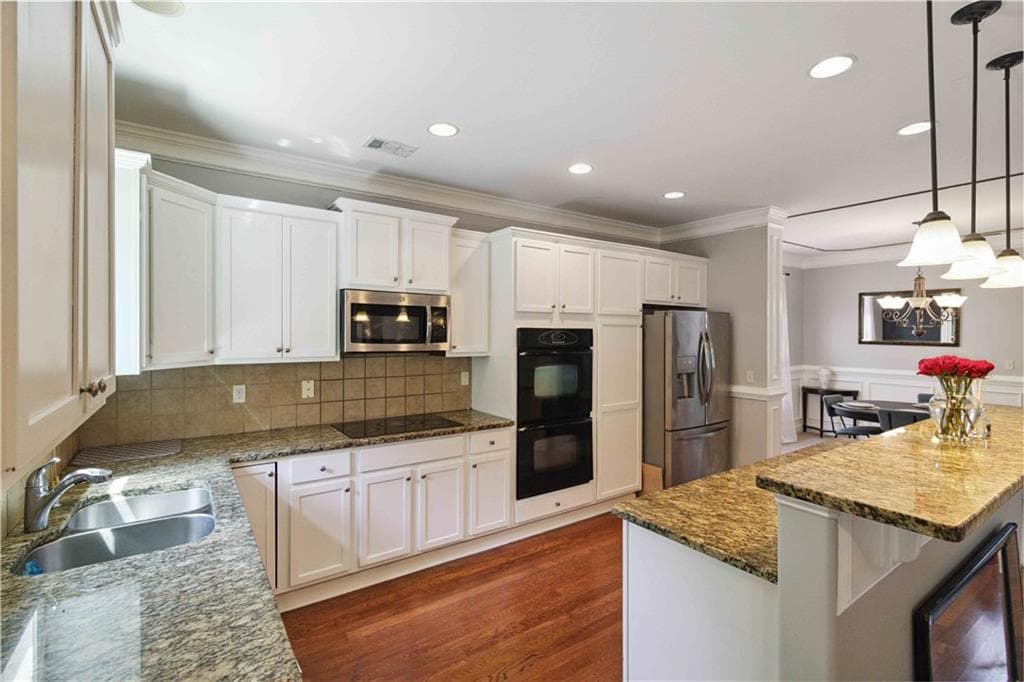 5 bedroom, 4 bathroom, 3,533 sq ft single family residence for sale at 1169 Leybourne Cove, Lawrenceville, GA 30045 — photo 7