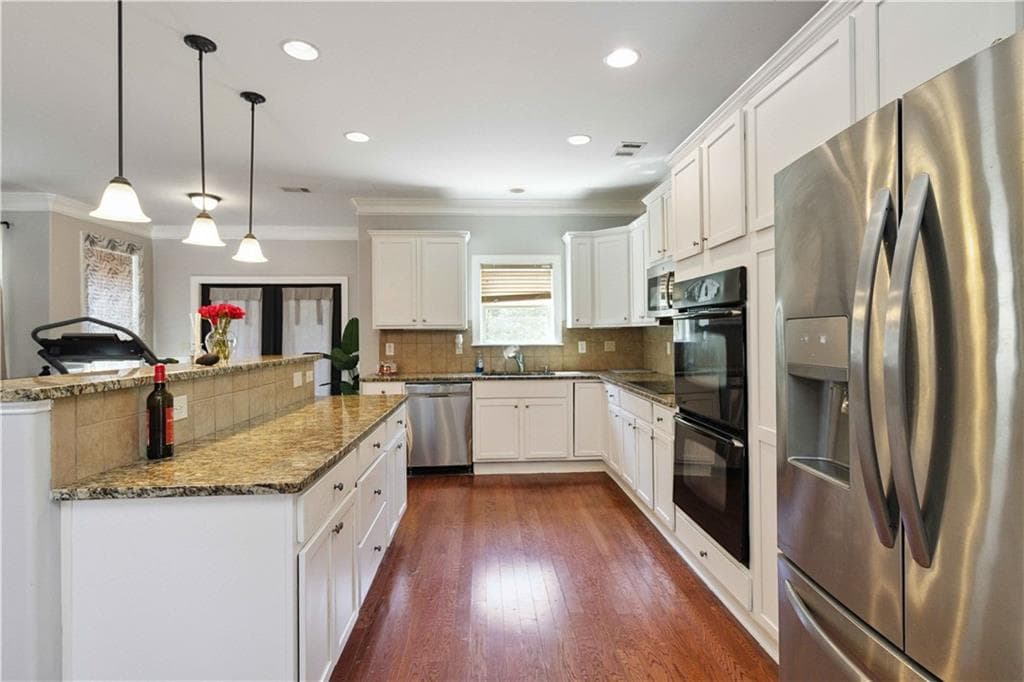5 bedroom, 4 bathroom, 3,533 sq ft single family residence for sale at 1169 Leybourne Cove, Lawrenceville, GA 30045 — photo 8