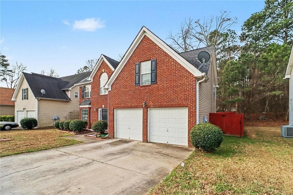 4 bedroom, 3 bathroom, 2,565 sq ft single family residence under contract at 5759 Shoals Place Trail, Atlanta, GA 30349 — photo 3