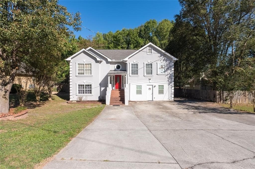 6 bedroom, 4 bathroom, 3,114 sq ft single family residence for sale at 61 Oxford Brook Way, Lawrenceville, GA 30046 — photo 2