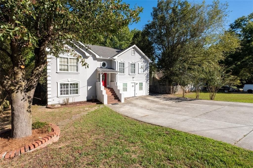 6 bedroom, 4 bathroom, 3,114 sq ft single family residence for sale at 61 Oxford Brook Way, Lawrenceville, GA 30046 — photo 4