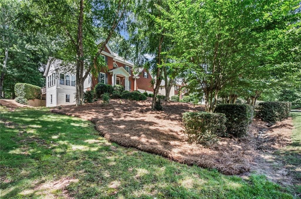 5 bedroom, 4 bathroom, 2,675 sq ft single family residence for sale at 4250 Meadow View Court, Cumming, GA 30041 — photo 2