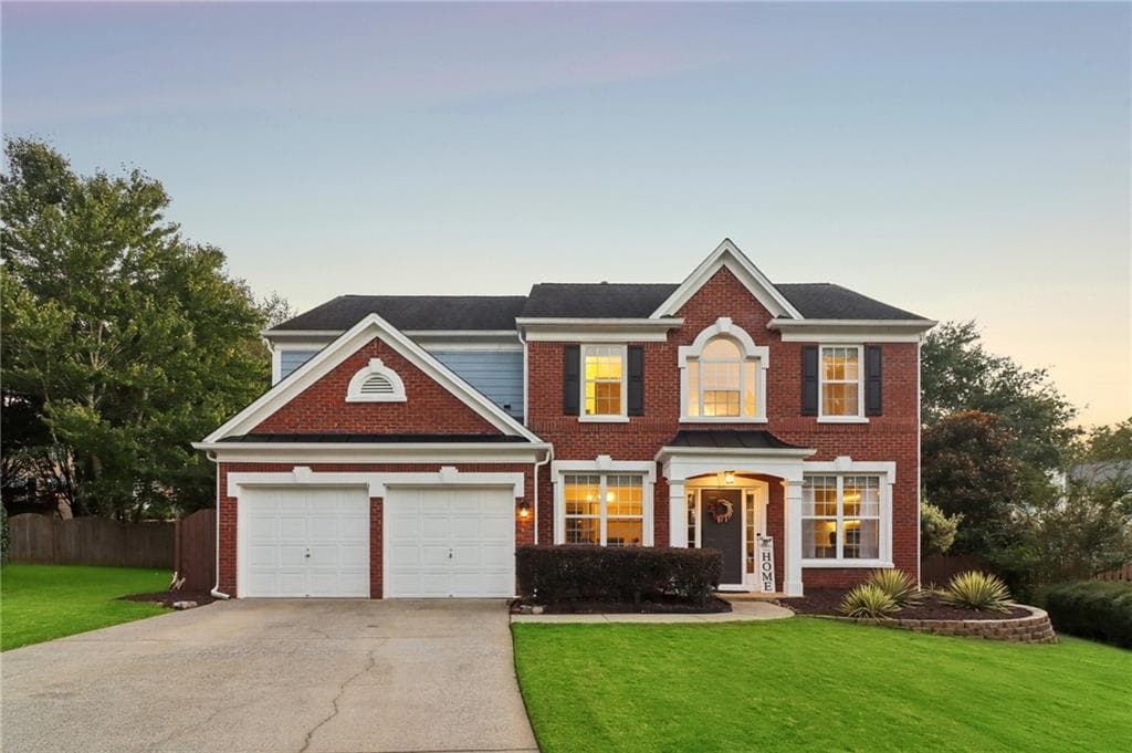 4 bedroom, 3 bathroom, 2,513 sq ft single family residence for sale at 5052 Raventhorpe Court, Suwanee, GA 30024