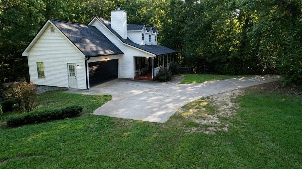 4 bedroom, 3 bathroom, 2,792 sq ft single family residence for sale at 8235 Mount Tabor Road, Cumming, GA 30028 — photo 2