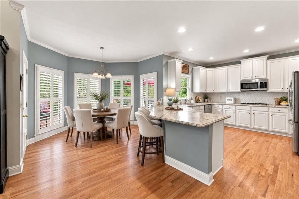 6 bedroom, 5 bathroom, 4,789 sq ft single family residence for sale at 1327 Bridgemill Avenue, Canton, GA 30114 — photo 9