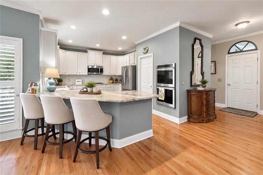 6 bedroom, 5 bathroom, 4,789 sq ft single family residence for sale at 1327 Bridgemill Avenue, Canton, GA 30114 — photo 10