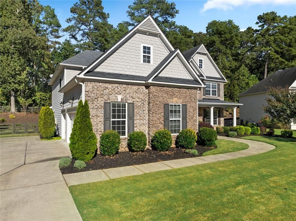 5 bedroom, 4 bathroom, 3,871 sq ft single family residence for sale at 6660 Canyon Cove, Cumming, GA 30028 — photo 4