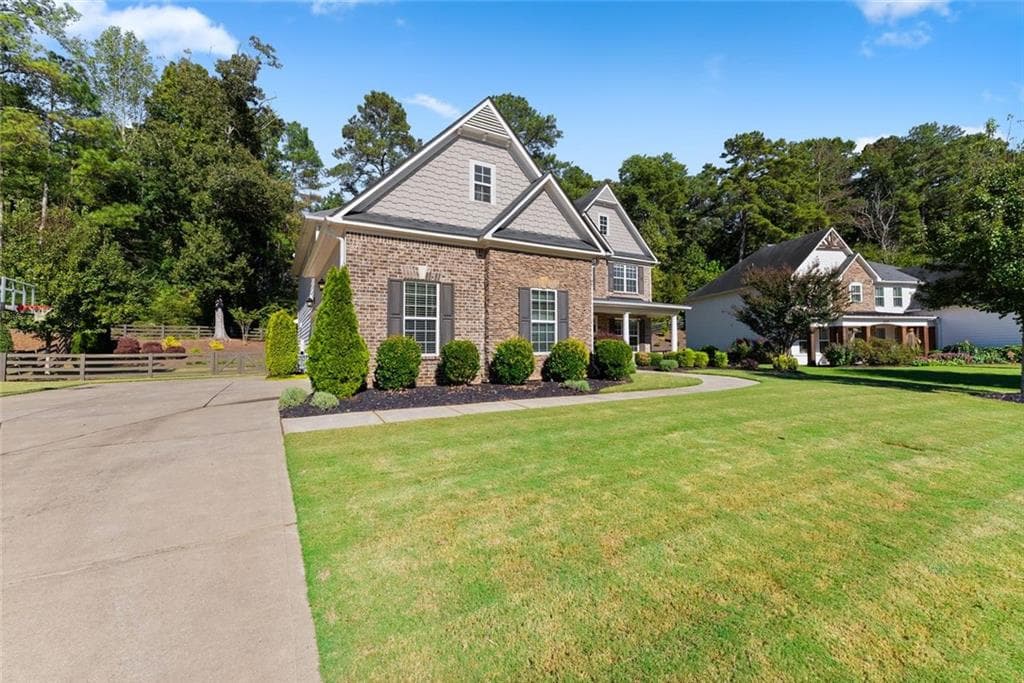 5 bedroom, 4 bathroom, 3,871 sq ft single family residence for sale at 6660 Canyon Cove, Cumming, GA 30028 — photo 5