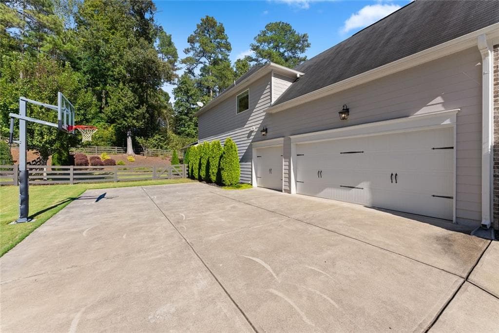 5 bedroom, 4 bathroom, 3,871 sq ft single family residence for sale at 6660 Canyon Cove, Cumming, GA 30028 — photo 8