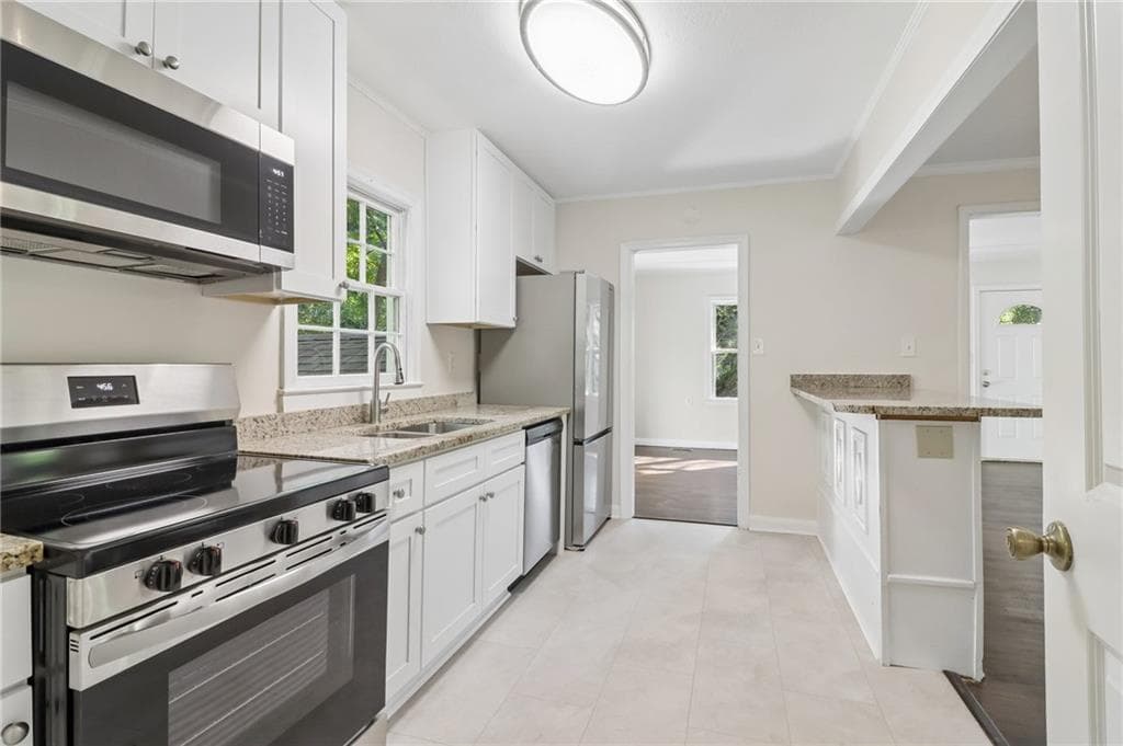 3 bedroom, 2 bathroom, 1,596 sq ft single family residence for sale at 1415 Blanche Drive, Marietta, GA 30067 — photo 9