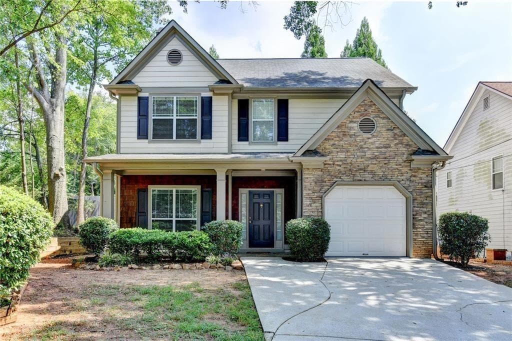 4 bedroom, 3 bathroom, 1,918 sq ft single family residence for sale at 1131 3rd Street, Stone Mountain, GA 30083 — photo 2