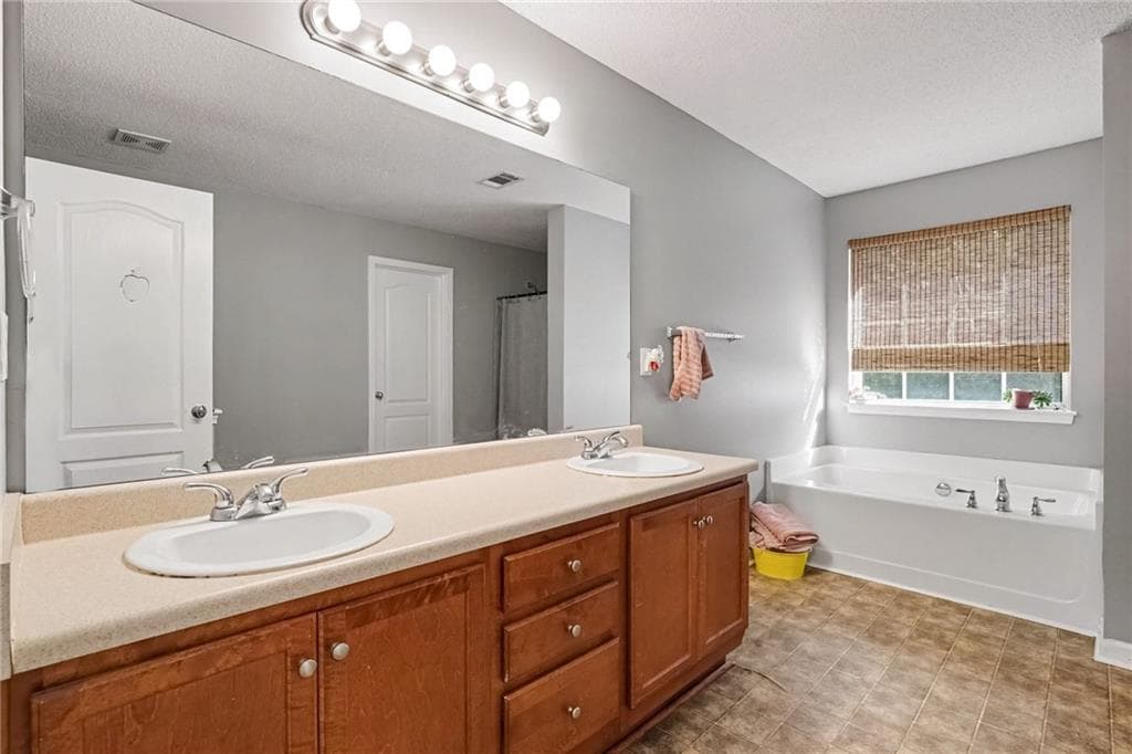 4 bedroom, 3 bathroom, 2,610 sq ft single family residence for sale at 614 Tranquillity Way, Mcdonough, GA 30252 — photo 7
