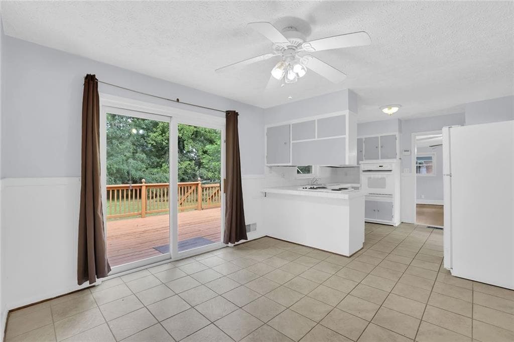 3 bedroom, 2 bathroom, 1,610 sq ft single family residence for sale at 1563 Rockbridge Road, Stone Mountain, GA 30087 — photo 4