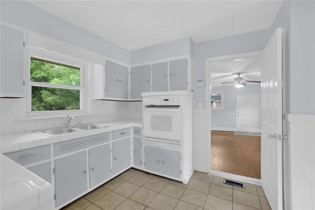 3 bedroom, 2 bathroom, 1,610 sq ft single family residence for sale at 1563 Rockbridge Road, Stone Mountain, GA 30087 — photo 6