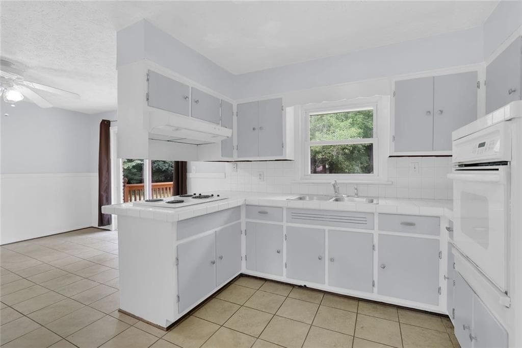 3 bedroom, 2 bathroom, 1,610 sq ft single family residence for sale at 1563 Rockbridge Road, Stone Mountain, GA 30087 — photo 7