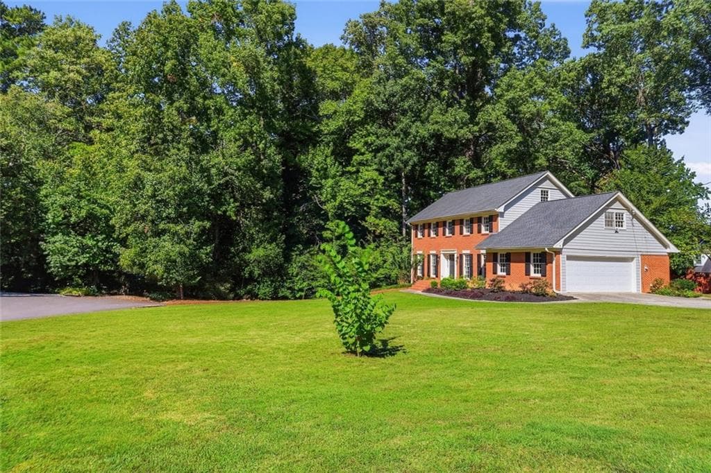 4 bedroom, 3 bathroom, 4,183 sq ft single family residence for sale at 1834 Village Mill Road, Dunwoody, GA 30338 — photo 2