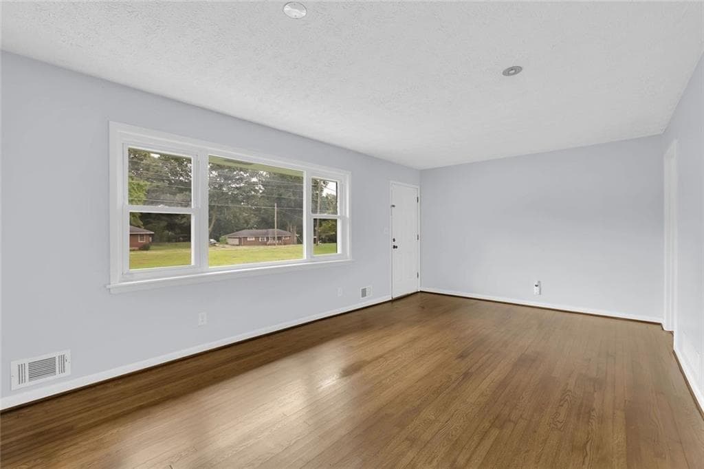 3 bedroom, 2 bathroom, 1,610 sq ft single family residence for sale at 1563 Rockbridge Road, Stone Mountain, GA 30087 — photo 9