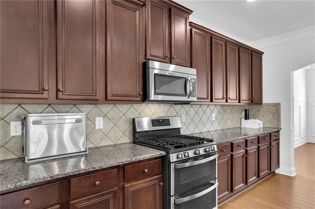 5 bedroom, 6 bathroom, 4,667 sq ft single family residence for sale at 4815 Wilshire Crossing, Cumming, GA 30040 — photo 5