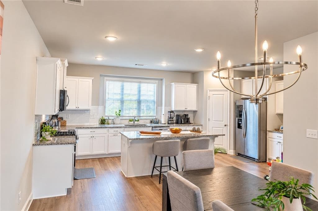 4 bedroom, 4 bathroom, 2,271 sq ft townhouse for sale at 1576 Gin Blossom Circle, Lawrenceville, GA 30045 — photo 4