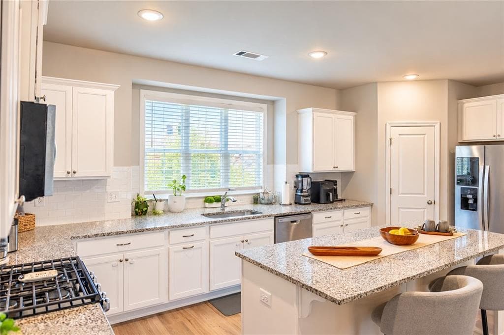 4 bedroom, 4 bathroom, 2,271 sq ft townhouse for sale at 1576 Gin Blossom Circle, Lawrenceville, GA 30045 — photo 5