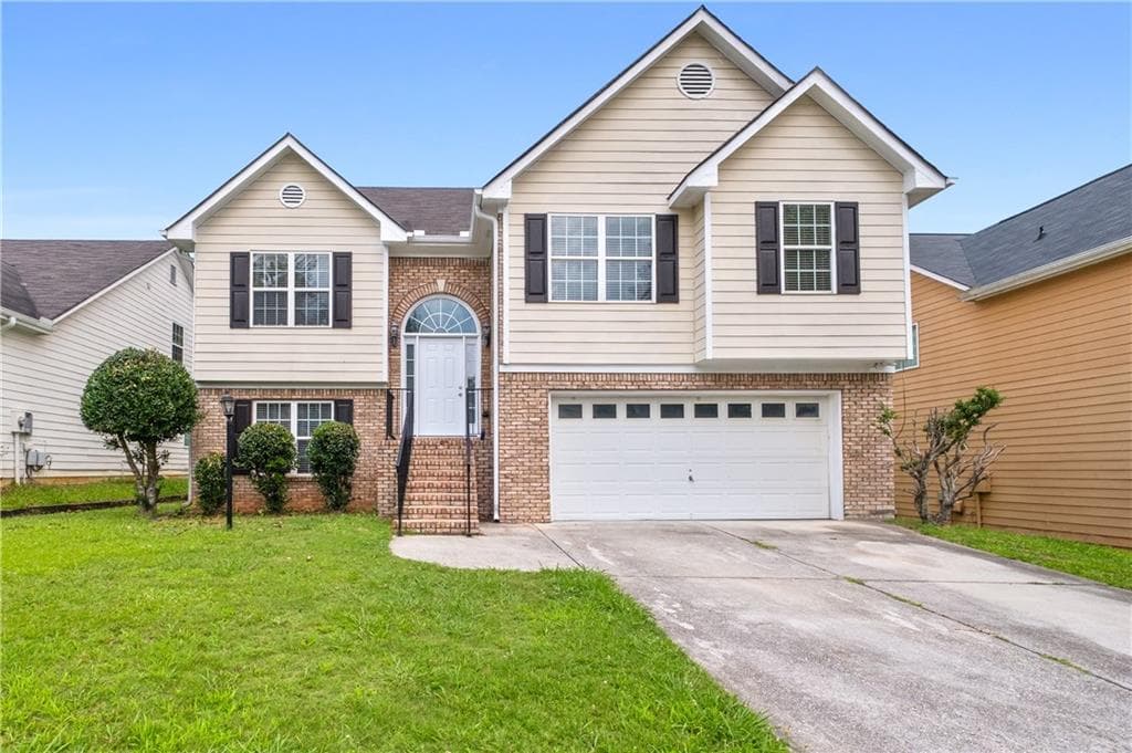 5 bedroom, 3 bathroom, 2,639 sq ft home for sale at 2323 Crimson Creek Lane, Snellville, GA