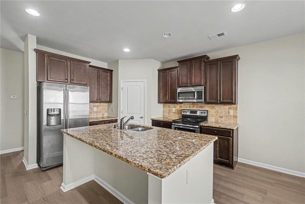 3 bedroom, 3 bathroom, 2,160 sq ft single family residence for sale at 705 Barberry Drive, Woodstock, GA 30188 — photo 2
