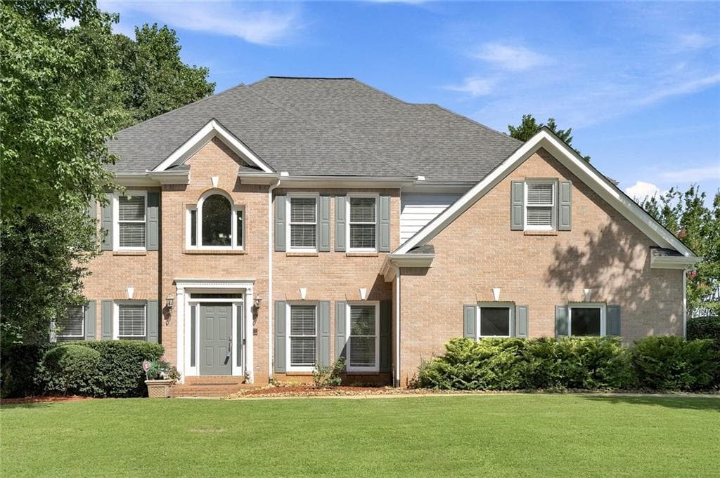6 bedroom, 4 bathroom, 4,935 sq ft single family residence for sale at 1735 Riverglen Drive, Suwanee, GA 30024
