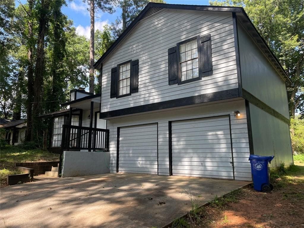 3 bedroom, 2 bathroom, 1,456 sq ft single family residence for sale at 4064 PANOLA WOODS Drive, Stonecrest, GA 30038 — photo 2