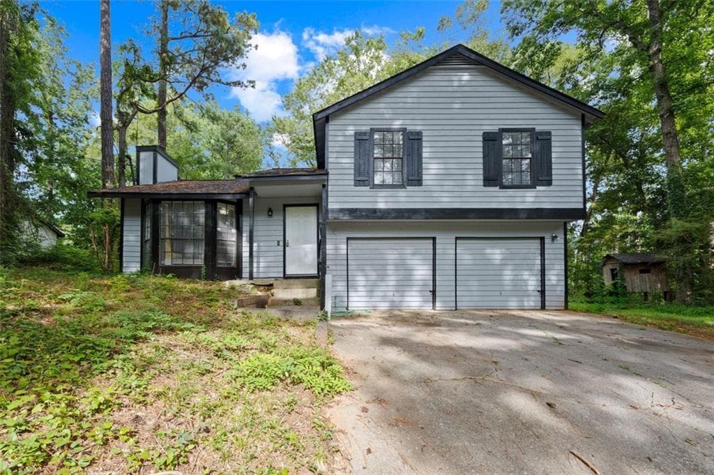3 bedroom, 2 bathroom, 1,456 sq ft single family residence for sale at 4064 PANOLA WOODS Drive, Stonecrest, GA 30038 — photo 3