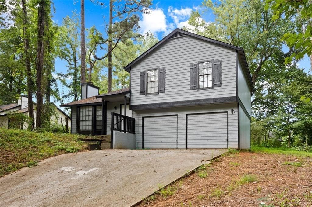 3 bedroom, 2 bathroom, 1,456 sq ft single family residence for sale at 4064 PANOLA WOODS Drive, Stonecrest, GA 30038 — photo 4
