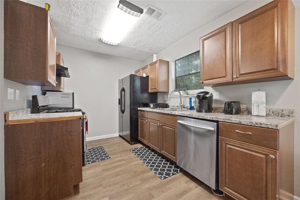 3 bedroom, 2 bathroom, 1,456 sq ft single family residence for sale at 4064 PANOLA WOODS Drive, Stonecrest, GA 30038 — photo 10