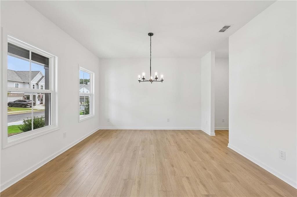 5 bedroom, 4 bathroom, 3,208 sq ft single family residence for sale at 5456 Hargrove Way, Flowery Branch, GA 30542 — photo 4