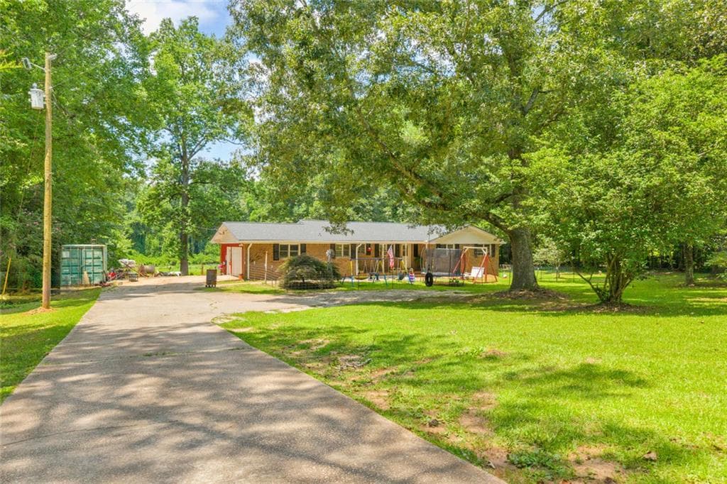 4 bedroom, 3 bathroom, 2,406 sq ft single family residence for sale at 849 Swan Lake Road, Stockbridge, GA 30281