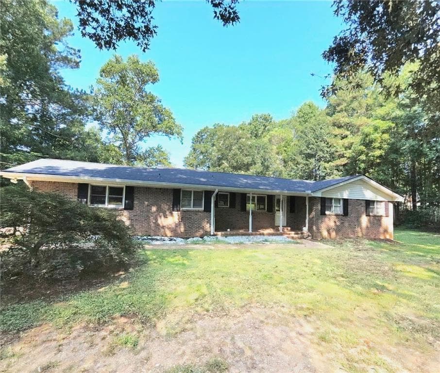 4 bedroom, 3 bathroom, 2,406 sq ft single family residence for sale at 849 Swan Lake Road, Stockbridge, GA 30281 — photo 2
