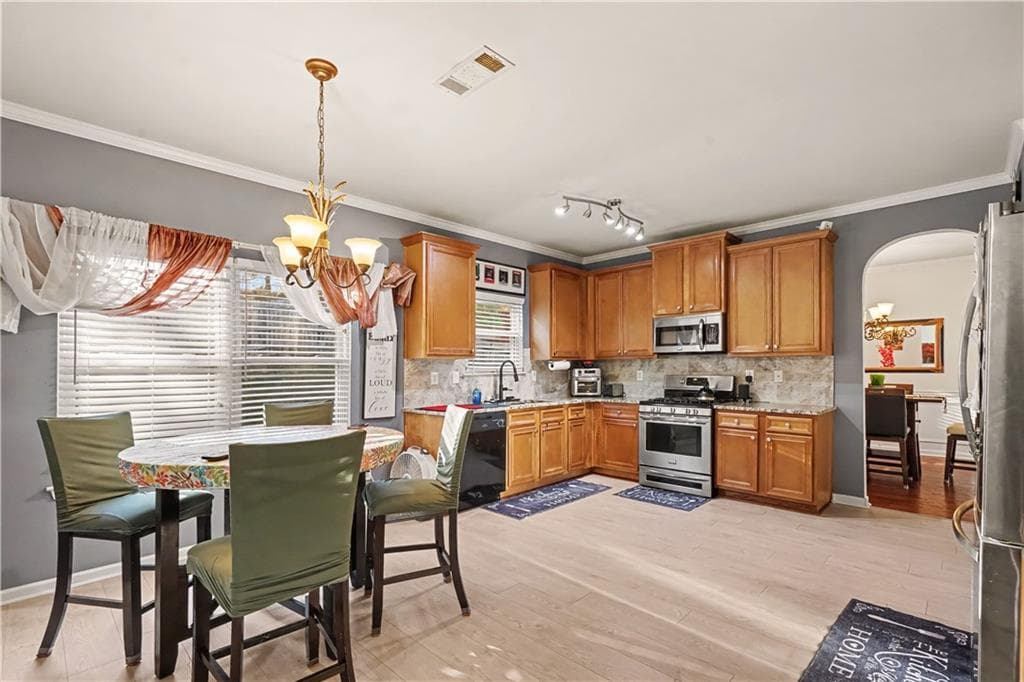 6 bedroom, 4 bathroom, 3,656 sq ft single family residence for sale at 3609 River Rock Road, Lithonia, GA 30038 — photo 10