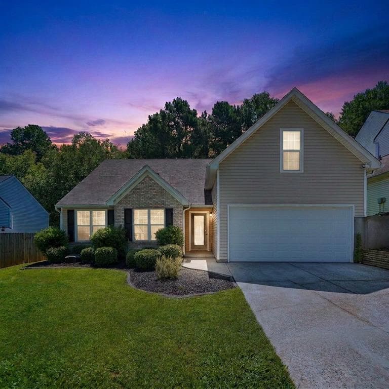 4 bedroom, 2 bathroom, 1,639 sq ft single family residence for sale at 1077 Woodsong Pass Court, Lawrenceville, GA 30043 — photo 2