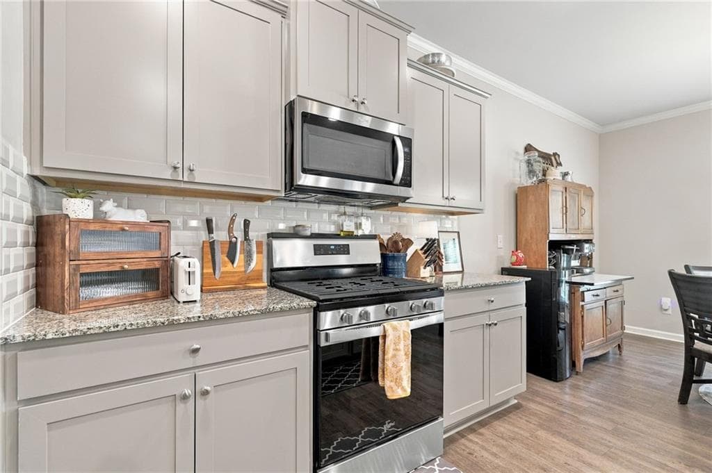 5 bedroom, 3 bathroom, 2,563 sq ft single family residence for sale at 4665 Dandelion Way, Cumming, GA 30040 — photo 10
