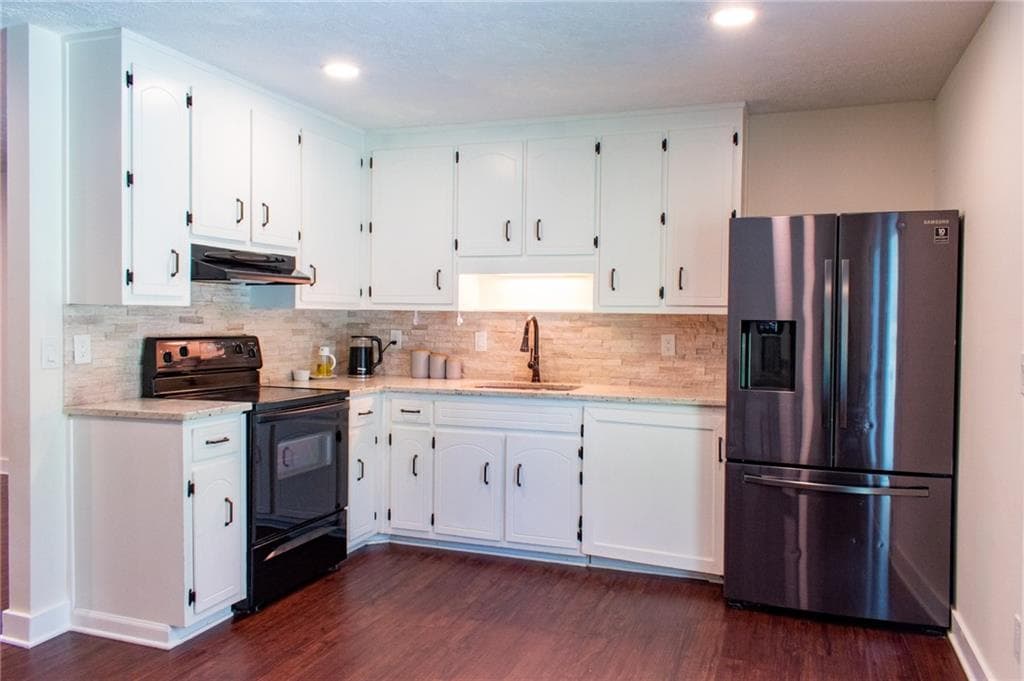 3 bedroom, 2 bathroom, 1,204 sq ft single family residence for sale at 1077 Sawgrass Court, Lilburn, GA 30047 — photo 6