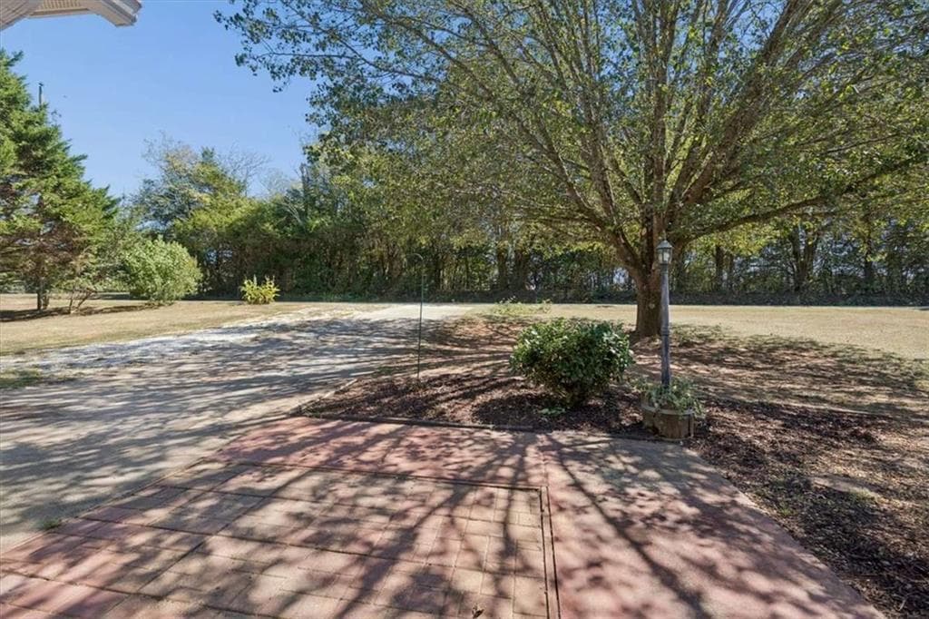 3 bedroom, 2 bathroom, 1,328 sq ft single family residence for sale at 1038 Little River Road, Social Circle, GA 30025 — photo 3