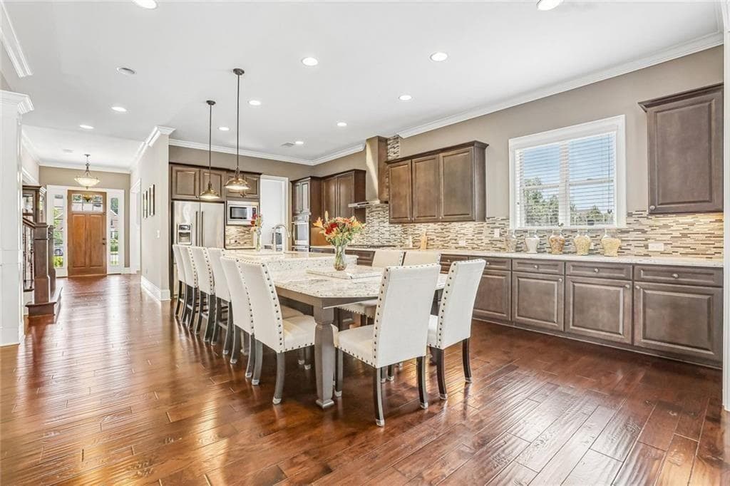 6 bedroom, 6 bathroom, 6,809 sq ft single family residence for sale at 3775 Jodeco Circle, Cumming, GA 30040 — photo 2