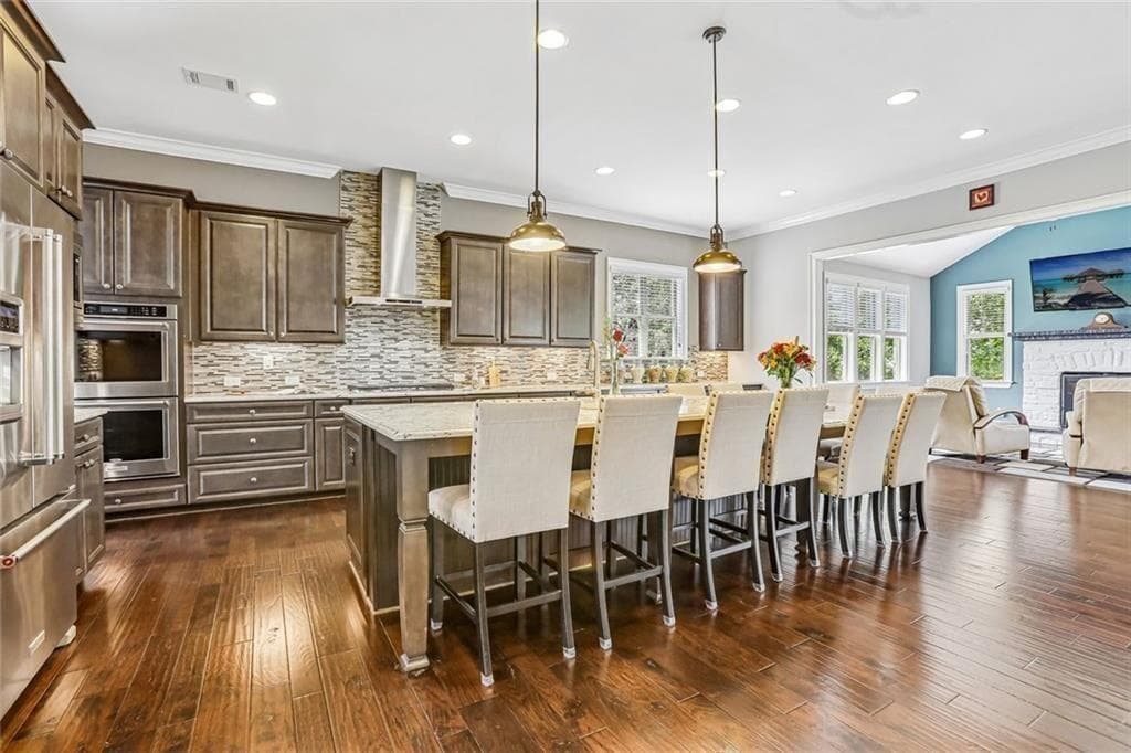 6 bedroom, 6 bathroom, 6,809 sq ft single family residence for sale at 3775 Jodeco Circle, Cumming, GA 30040 — photo 3