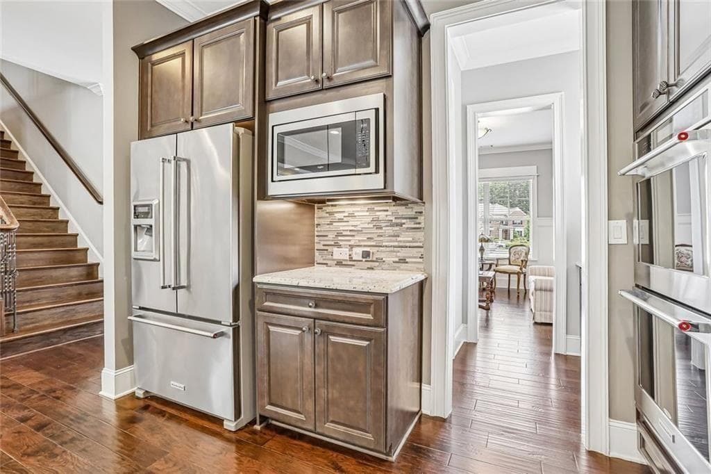 6 bedroom, 6 bathroom, 6,809 sq ft single family residence for sale at 3775 Jodeco Circle, Cumming, GA 30040 — photo 5