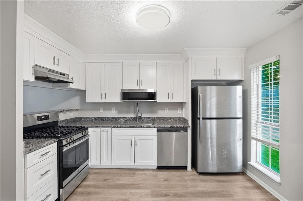 3 bedroom, 3 bathroom, 1,648 sq ft single family residence for sale at 6449 Eastbriar Drive, Lithonia, GA 30058 — photo 10